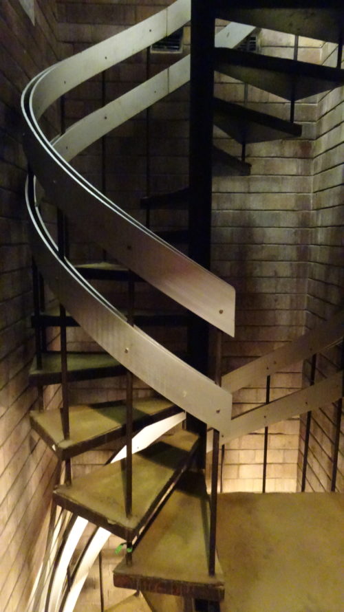 A detailed view of the the spiral staircase connecting the basement and ground floor