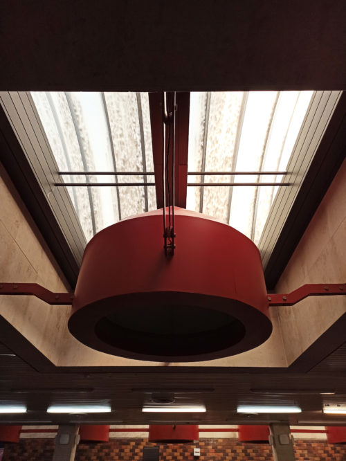 Entrance hall – metal-based lighting sculpture situated below a roof skylight