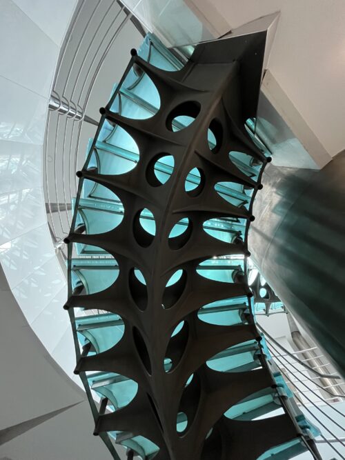 Detailed view of the organically shaped stringboard of the staircase