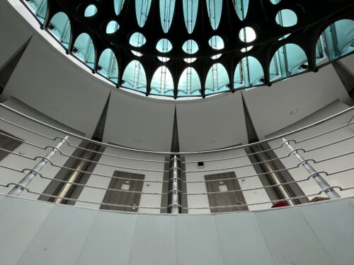 The interior of the central hall is completed by a custom-designed railing