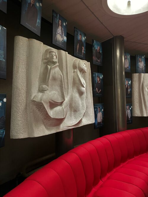 The bar space is decorated by stone reliefs by Tibor Kavecký and photographs of performing actors