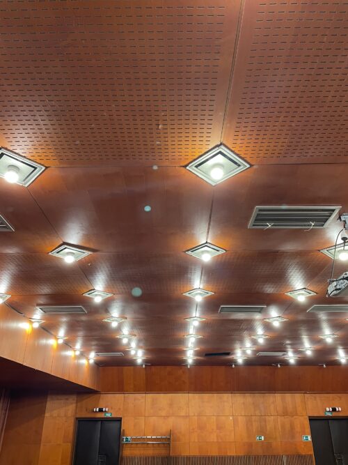 The Orange Room – the soffit is created by using solid and perforated square modules in combination with lights fitted at their intersections 