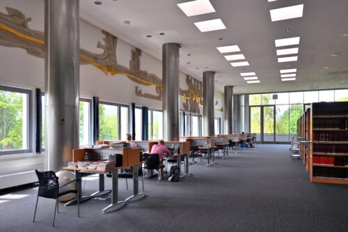 The university study room named "the Golden Thread" is complemented by the eponymous gypsum relief by artist Emilia Bellušová; original chairs have been replaced by new ones