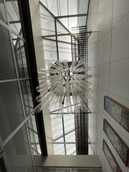 The sculptural light object in the staircase space