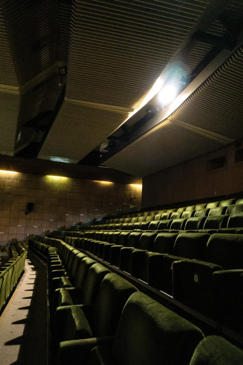 The interior of the theatre hall has a pleasant subdued light atmosphere 