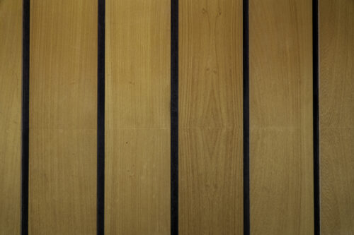 A close-up view of the omnipresent wooden panelling with visually pronounced slits 