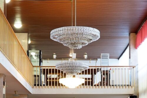Dominant design components of the coffee bar & tearoom are suspended chandeliers